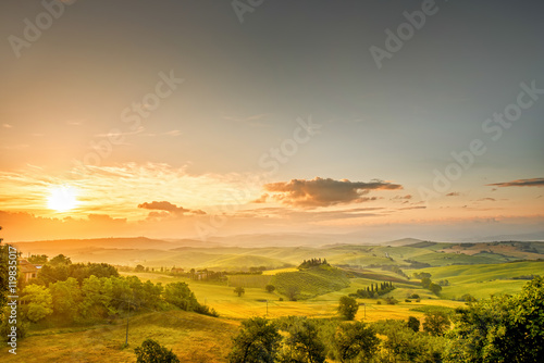 Beautiful tuscan landscape view in Val dOrcia region near Pienza town on the morning in Italy. Wide angle photo with copy space