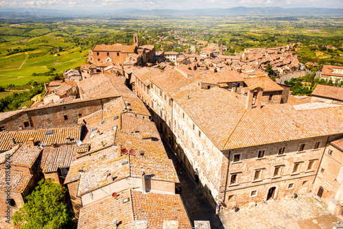 Montepulciano cityscape view on the old buildings and Saint Agostino church in Tuscany region in Italy photo