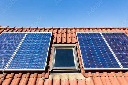 Blue solar collectors and attic window