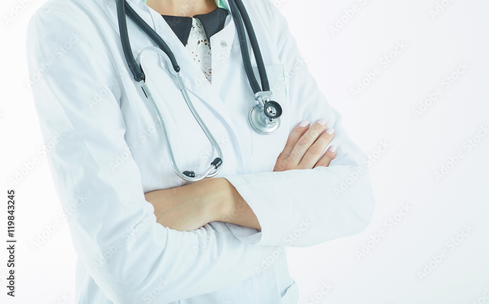 Mid section of female medicine doctor standing with hands crossed on her chest closeup. Medical help or insurance concept. Mid section of female medicine doctor standing with hands crossed on her chest closeup. Medical help or insurance concept.