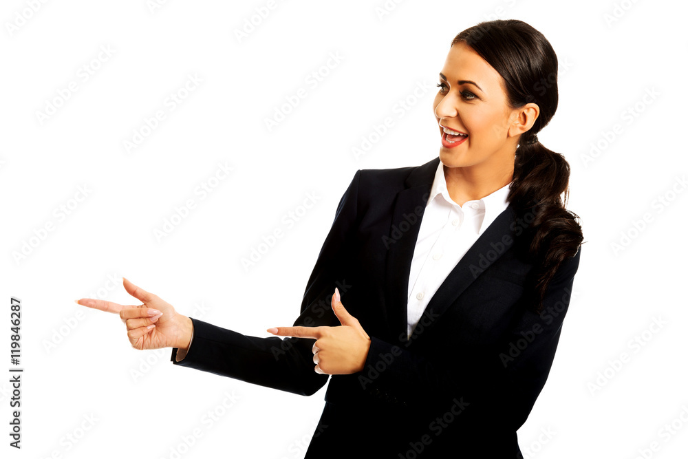 Businesswoman pointing to the left Businesswoman pointing to the left