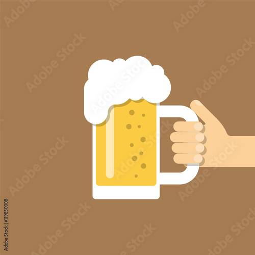 Hand holds a beer mug