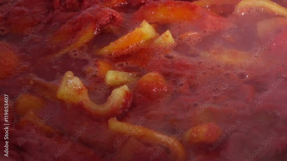 Slow motion video of stiring boiling tomato and pepper - home made tomato paste, ketchup. Full Hd stock footage clip.
Slow motion video of stiring boiling tomato and pepper - home made tomato paste, ketchup. Full Hd stock footage clip.
