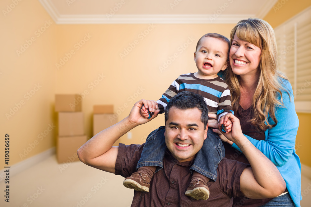 Young Mixed Race Family In Room With Moving Boxes Young Mixed Race Family In Room With Moving Boxes