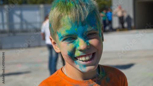 beautiful funny child on the festival of colors
