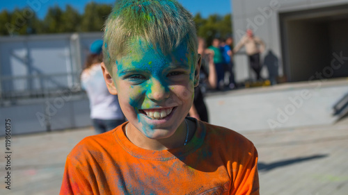 the happy child on the festival of colors