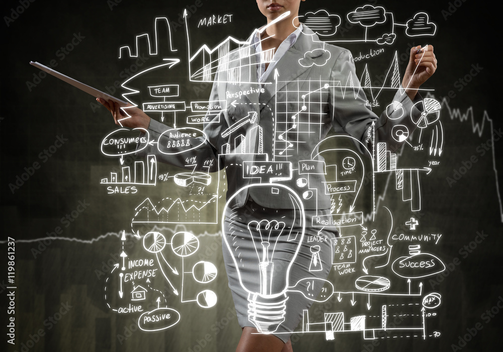 Woman sketching business ideas Woman sketching business ideas
