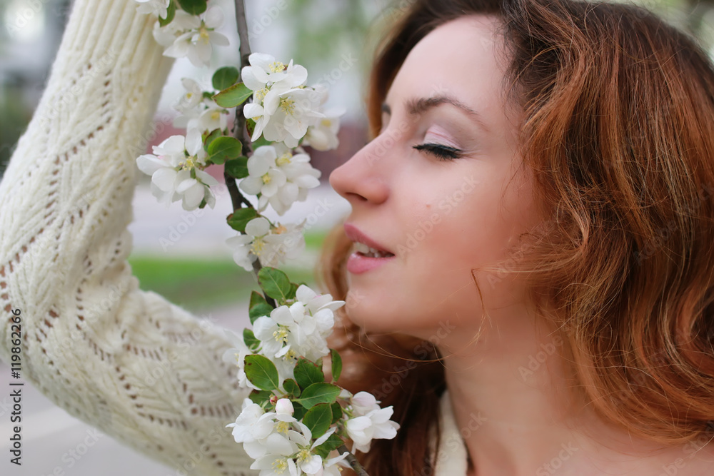 woman smell tree flower woman smell tree flower