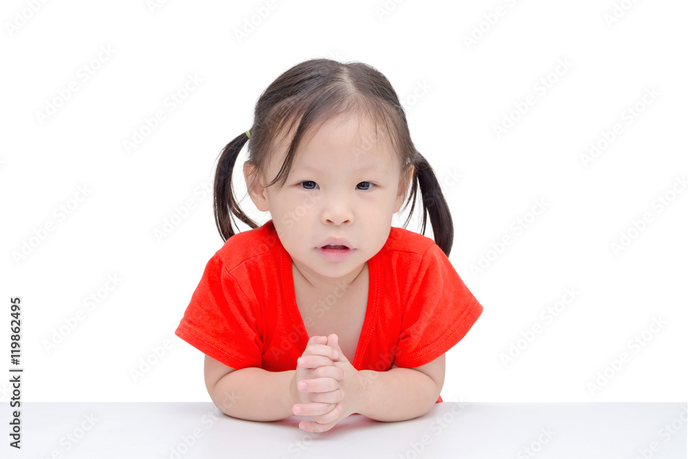 Young asian girl looking at camera over white background Young asian girl looking at camera over white background