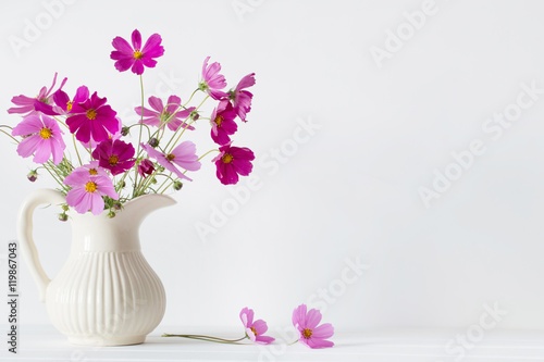 Fototapeta Naklejka Na Ścianę i Meble -  flowers in a vase on white background