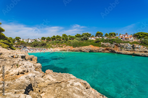 View to the beach of Cala Anguila with turquoise blue water Majorca Spain