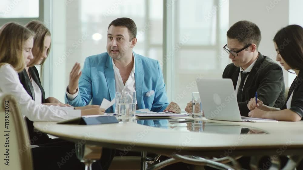 businessman yelling at his subordinates businessman yelling at his subordinates