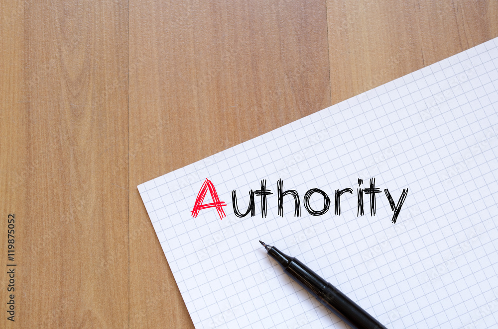 Authority text concept on notebook Authority text concept on notebook