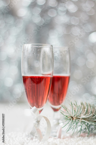 Pink champagne and new year decorations.Soft focus