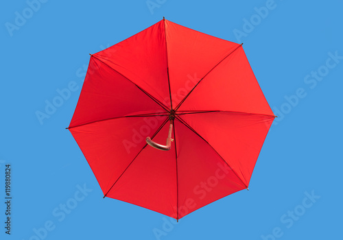 Rainbow umbrella isolated on sky