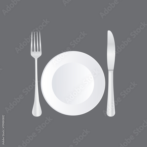 Empty plate with spoon, knife and fork