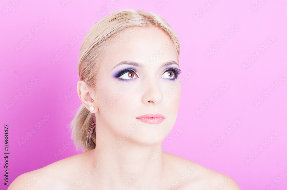 Portrait of woman posing with professional trendy make-up Portrait of woman posing with professional trendy make-up