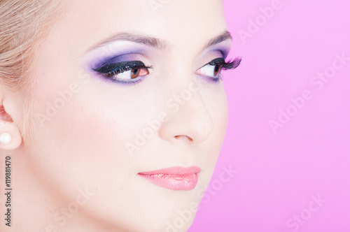 Close-up of woman posing as beauty professional make-up