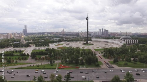 Aerial city panorama of Moscow in the poklonnaya gora area. Camera is hovering in the air and filming real time video, car traffic.