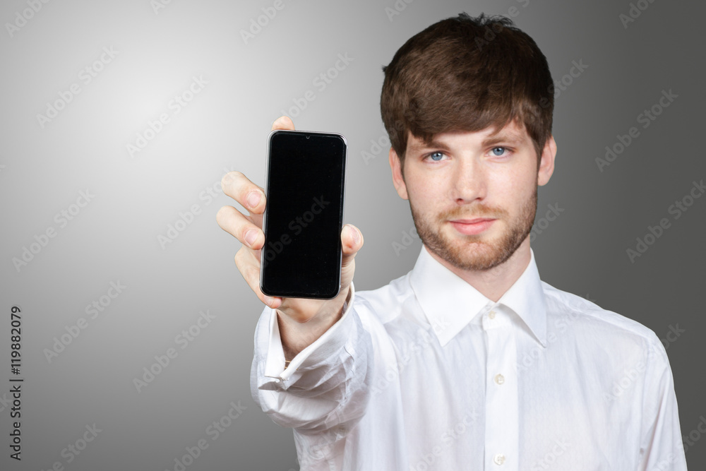 Businessman showing blank smartphone screen Businessman showing blank smartphone screen