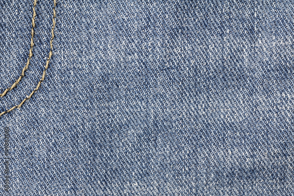 Denim jeans texture or denim jeans background with seam. Old grunge vintage denim jeans. Stitched texture denim jeans background of jeans fashion design. Denim jeans texture or denim jeans background with seam. Old grunge vintage denim jeans. Stitched texture denim jeans background of jeans fashion design.