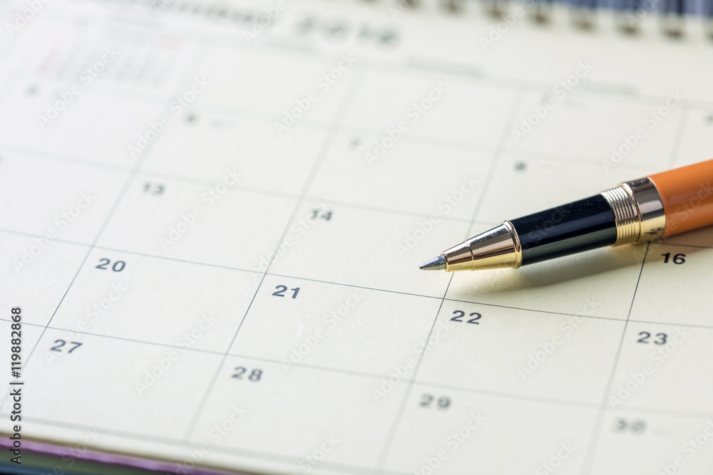 Pen on calendar with red circle. planning concept Pen on calendar with red circle. planning concept