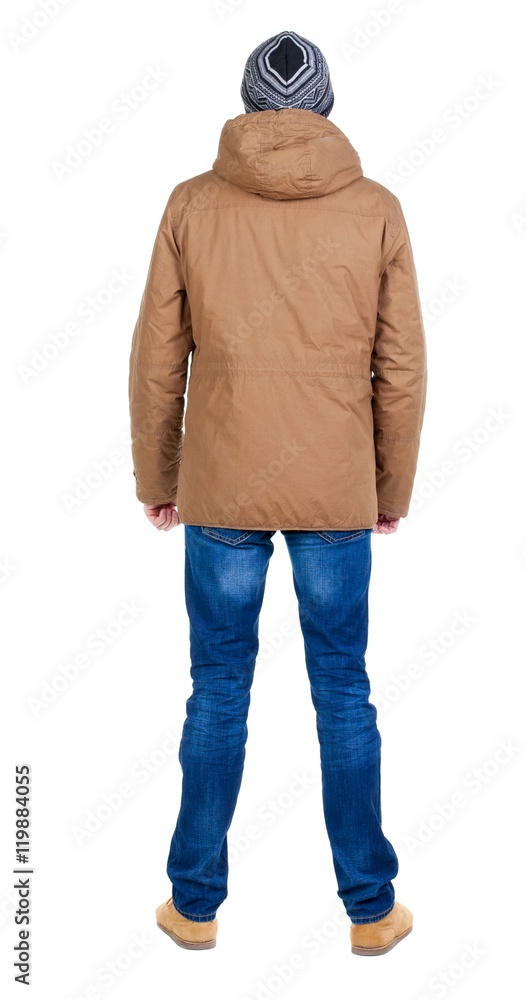 Back view of handsome man in winter jacket looking up. Standing young guy in parka. Rear view people collection. backside view of person. Isolated over white background. Back view of handsome man in winter jacket looking up. Standing young guy in parka. Rear view people collection. backside view of person. Isolated over white background.
