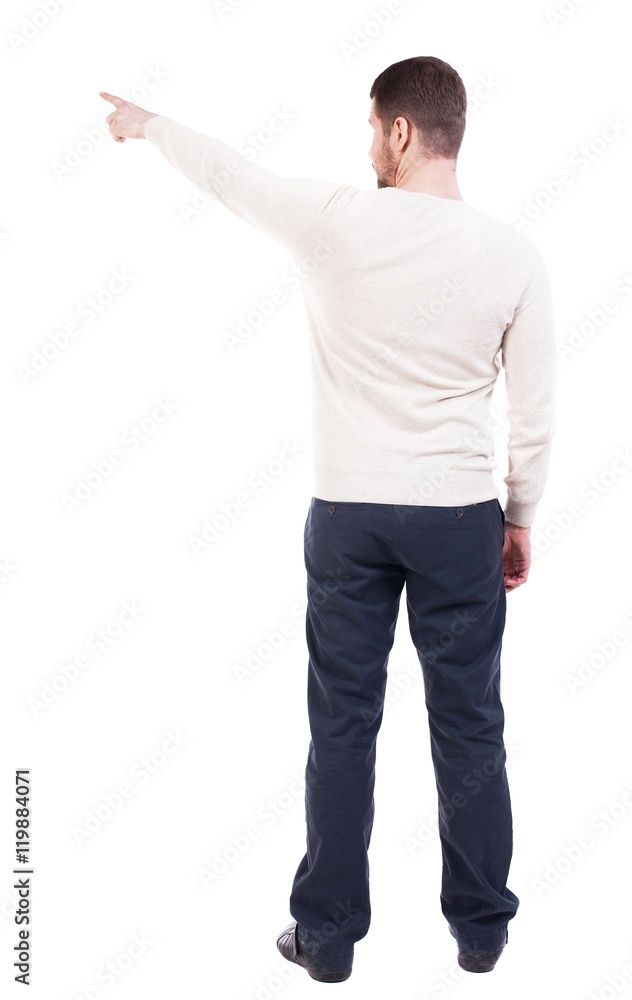 Back view of pointing business man. gesticulating young guy in black suit. Rear view people collection. backside view of person. Isolated over white background. office worker in a shirt and trousers Back view of pointing business man. gesticulating young guy in black suit. Rear view people collection. backside view of person. Isolated over white background. office worker in a shirt and trousers