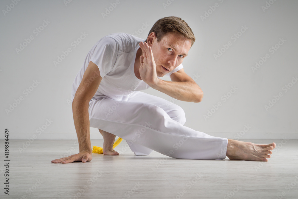 Naklejka premium Man practicing capoeira , brazilian martial art.