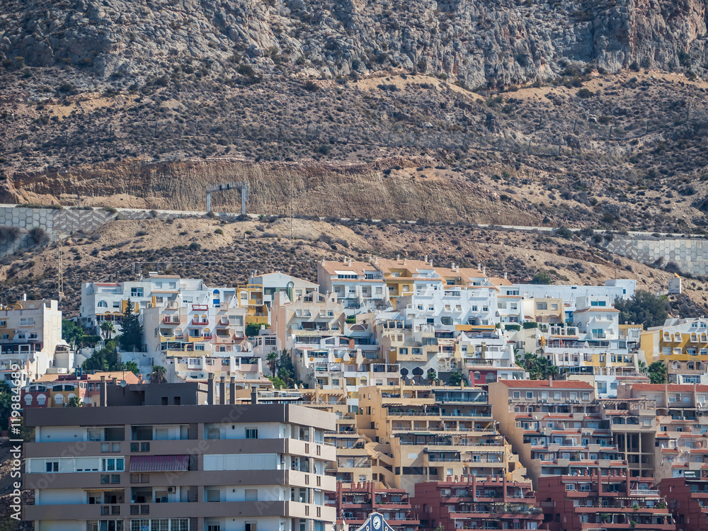 apartment buildings on a slope of a mountain