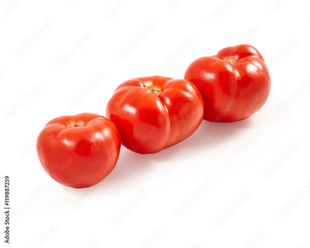 A tomato. Red tomato on a white background. Harvest vegetables. Autumn harvest. Red, juicy, ripe tomato. A tomato. Red tomato on a white background. Harvest vegetables. Autumn harvest. Red, juicy, ripe tomato.