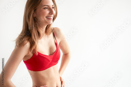 bright closeup portrait picture of beautiful woman in bra © kegfire