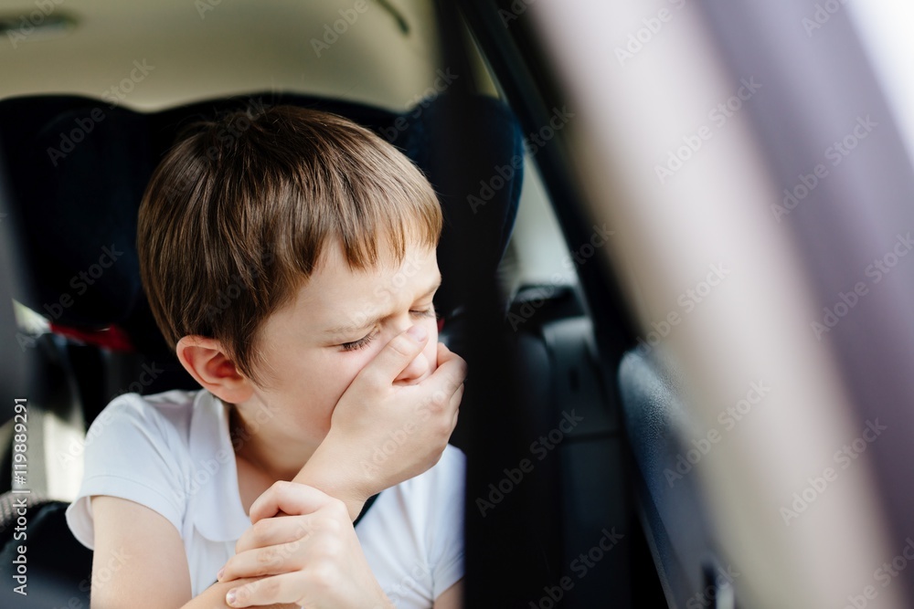 Child suffers from motion sickness in car