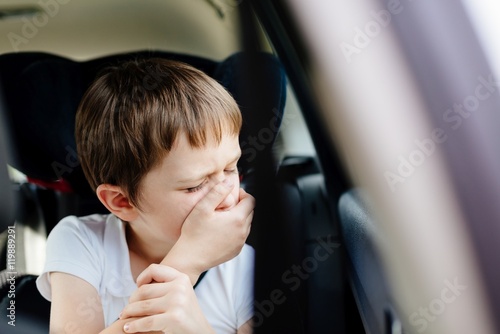 Obraz na płótnie Child suffers from motion sickness in car w salonie