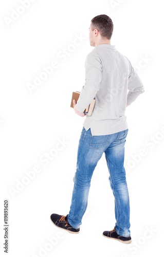 man goes and has a stack of books. back view. Rear view people collection. backside view of person. Isolated over white background.