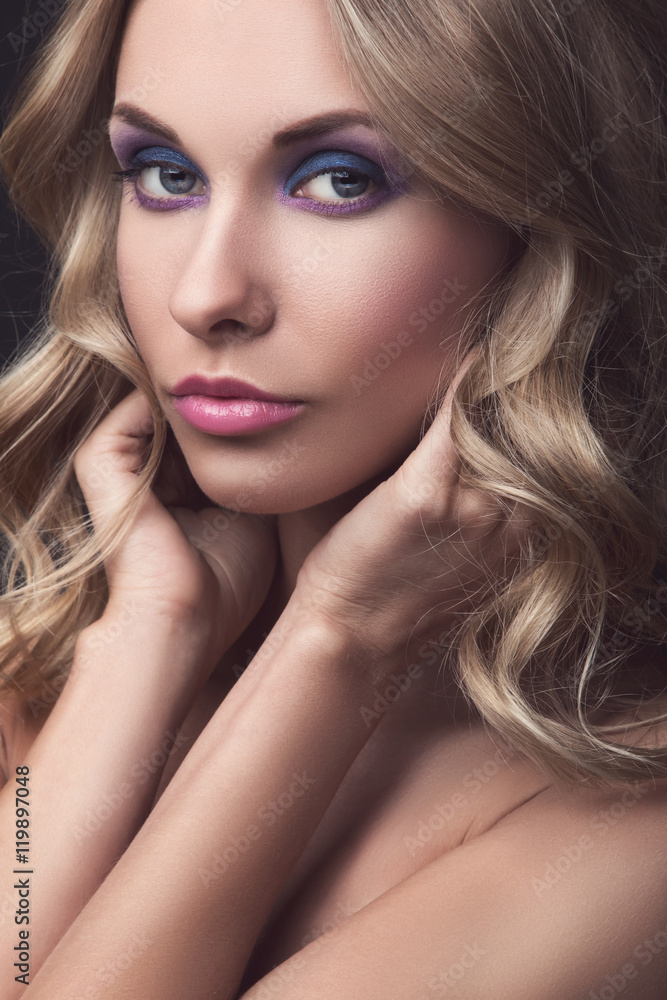 Blonde woman with curly hair