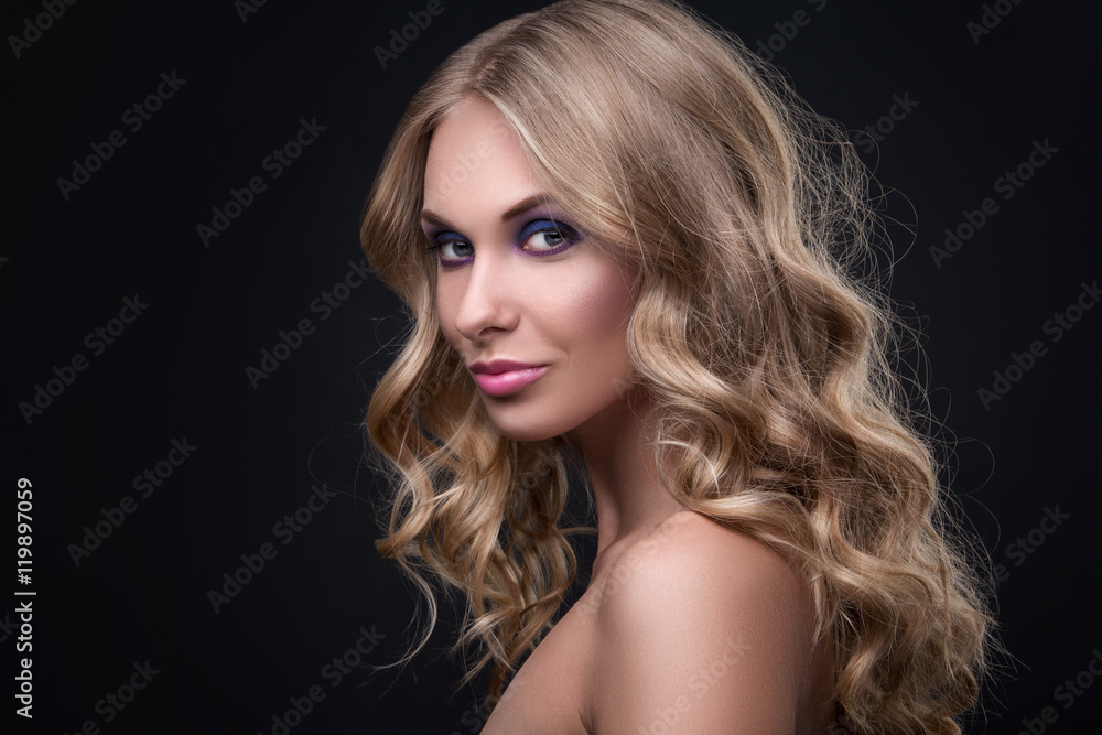 Fototapeta premium Blonde woman with curly hair