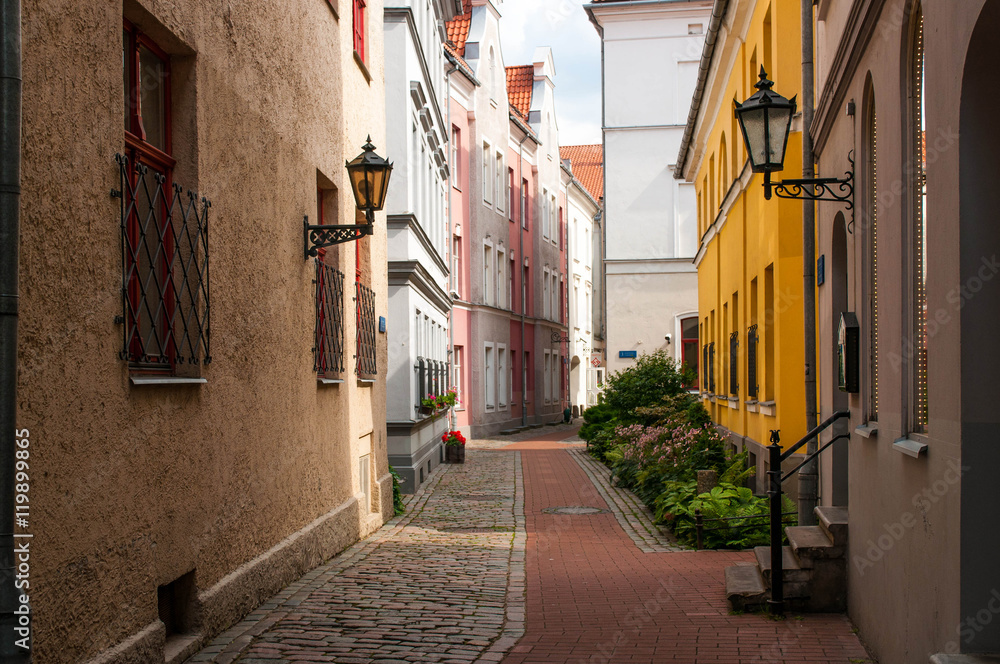 Fototapeta premium Narrow medieval street in the old Riga city