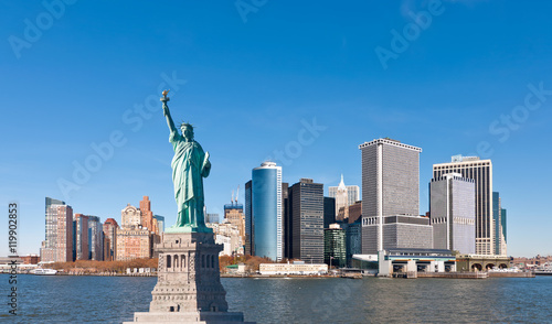 The Statue of Liberty and New York City Skyline © Val Traveller