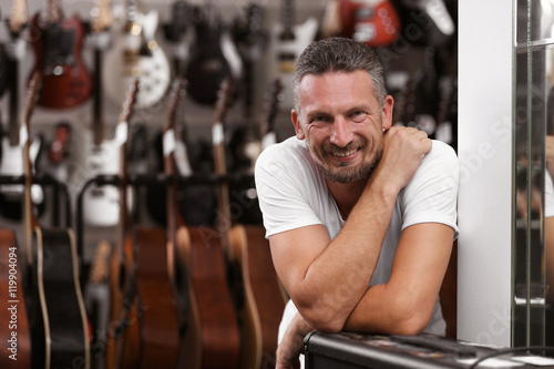 Handsome man in music shop