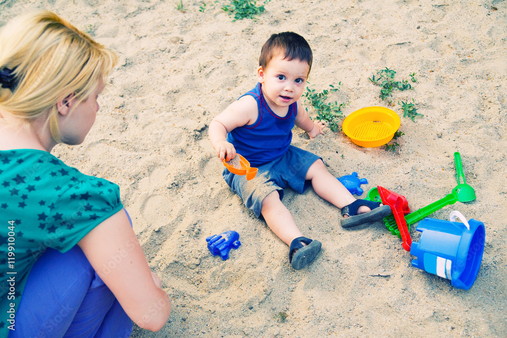 Child playing in sand