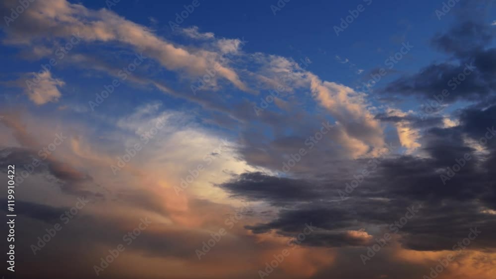 Moving clouds on sky. Sunset. Nature background.
Moving clouds on sky. Sunset. Nature background.
