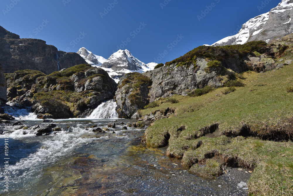 Torrent with the waterfalls on the plateau Maillet
