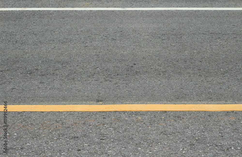 Fototapeta premium Asphalt texture with road markings background
