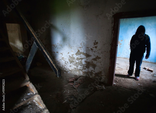  Dark man in old house