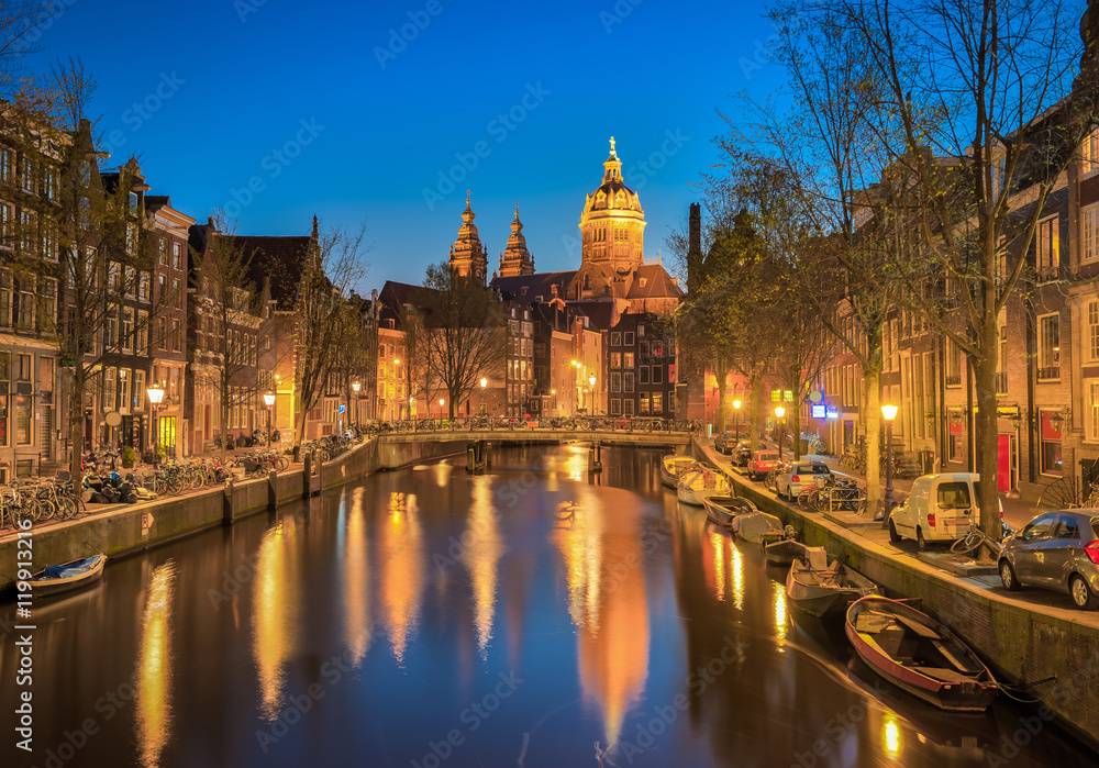 Canals of Amsterdam at night.