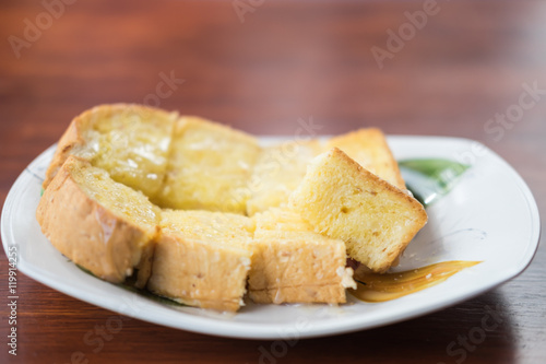 Bread toast and drips of condensed milk