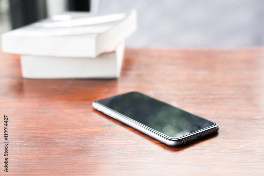 Smart phone with blank screen lying on wooden table, Smart phone with blank screen lying on wooden table,