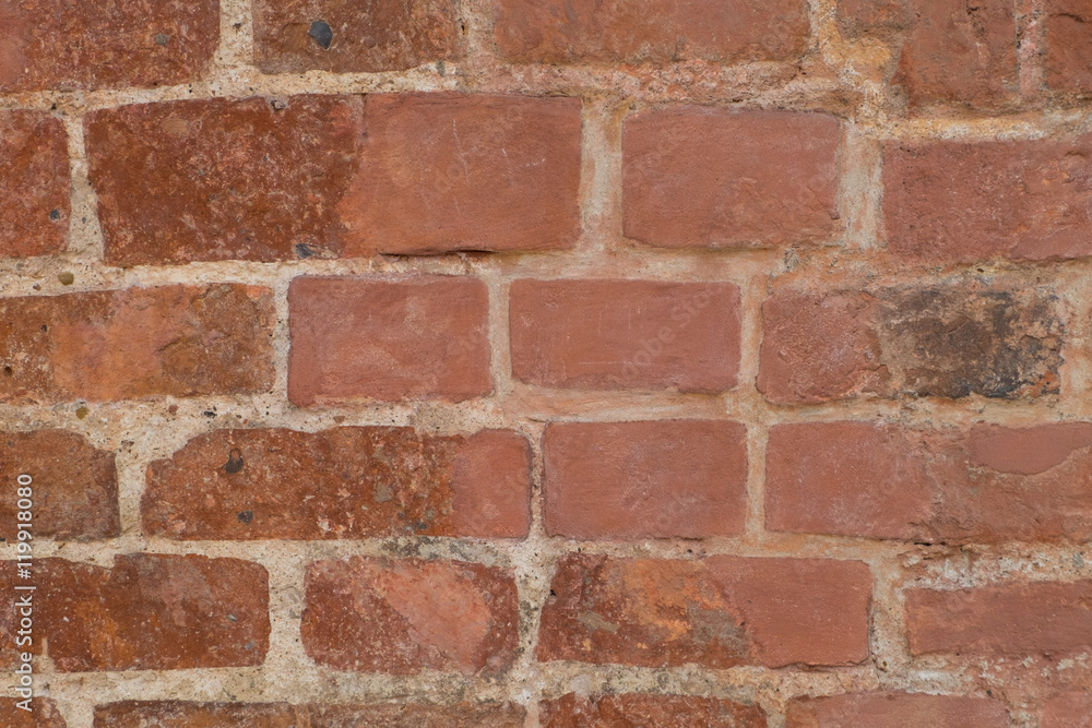 Fototapeta premium Red brick dirty wall.