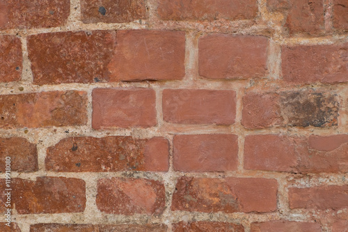Red brick dirty wall.